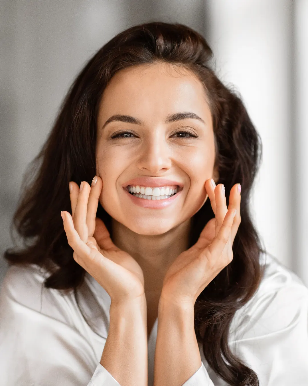 A patient enjoying the natural, refreshed results of Emface and Exion